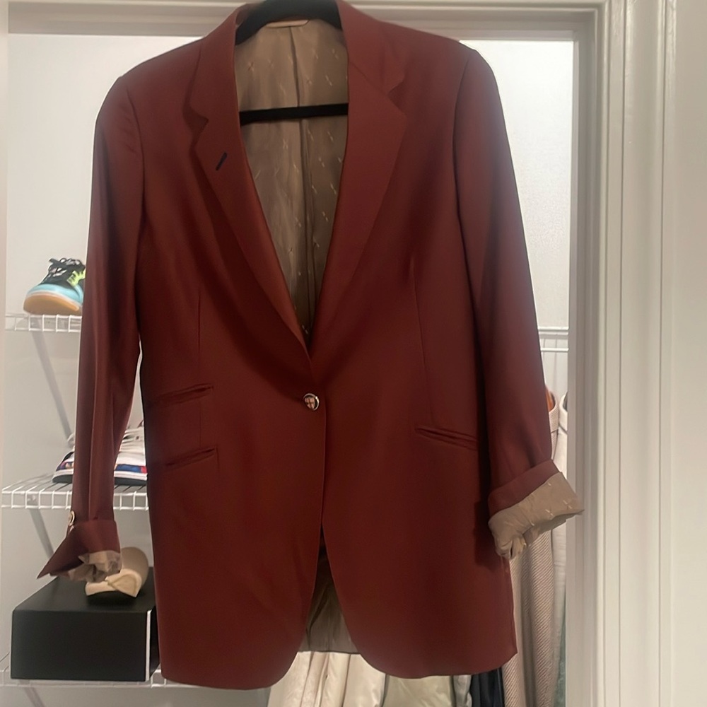 Custom maroon blazer with functional button holes and ticket pocket